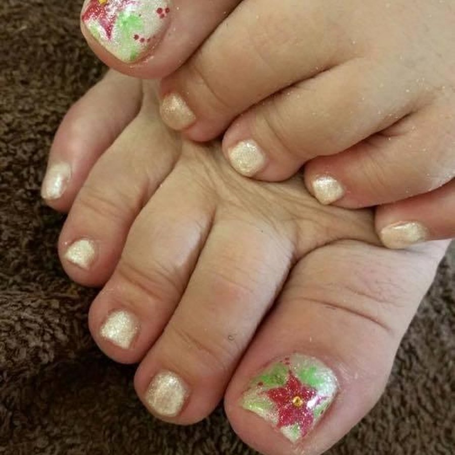 Spa pedicure with glitter and star accent toes in OKC
