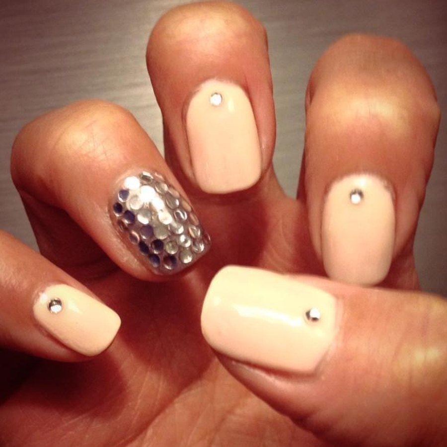 Nude gel manicure with gold glitter accent nail done at Designers Plus nail salon in Oklahoma City