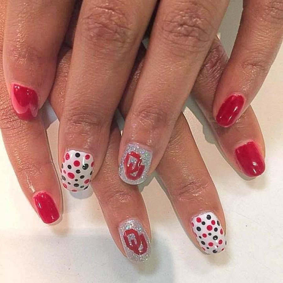Red gel manicure with white polka dot accent nails, manicure near Nichols Hills OK